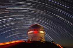 Picture of the Gemini North dome with Southern Star-trails in the background.