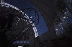 Picture of the interior of the Gemini North telescope illuminated by Moonlight.