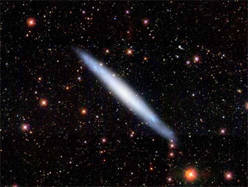 SDSS g-r-i’ band image of the late-type spiral NGC 4244 seen edge-on.