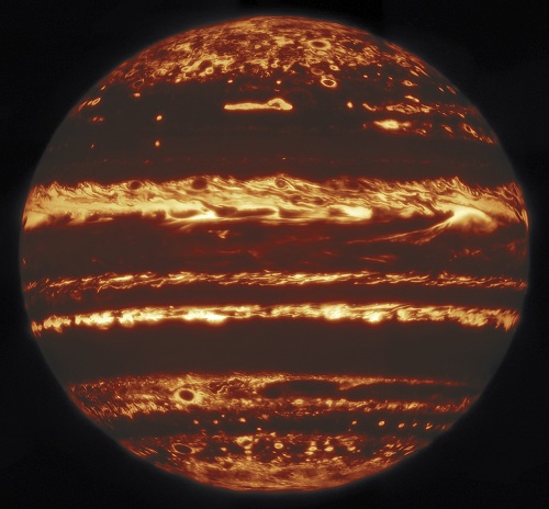 Full-disk view of Jupiter in infrared light (4.7 μm), captured with Gemini Observatory's Lucky Imaging. Image combines the sharpest 10% of 342 exposures from multiple pointings.