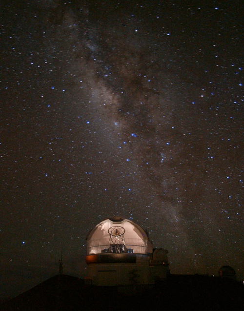 Picture showing the Gemini North Telescope below a starful sky